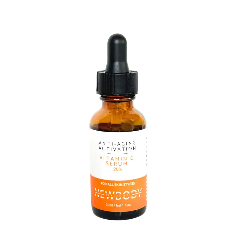 Vitamin C serum bottle with dropper on a white background